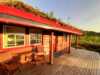 The Midnight sun shines on the studio cabin with terrace