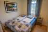 Double bed in the bedroom in the studio cabin