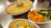 Moos pie in baking form with vegetables in serving bowl 
